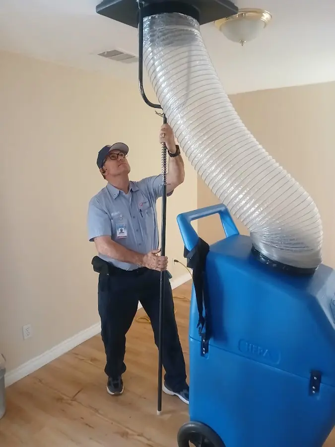 HVAC Installation technician using HEPA equipment in Daphne